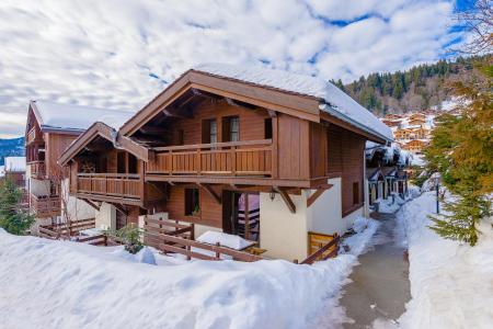 Ski verhuur Résidence Les Fermes d'Emiguy - Les Gets - Buiten winter