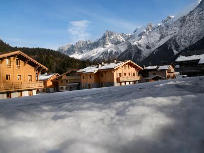 Vacances en montagne Résidence Boutique Le Hameau de Pierre Blanche - Les Houches - Extérieur hiver