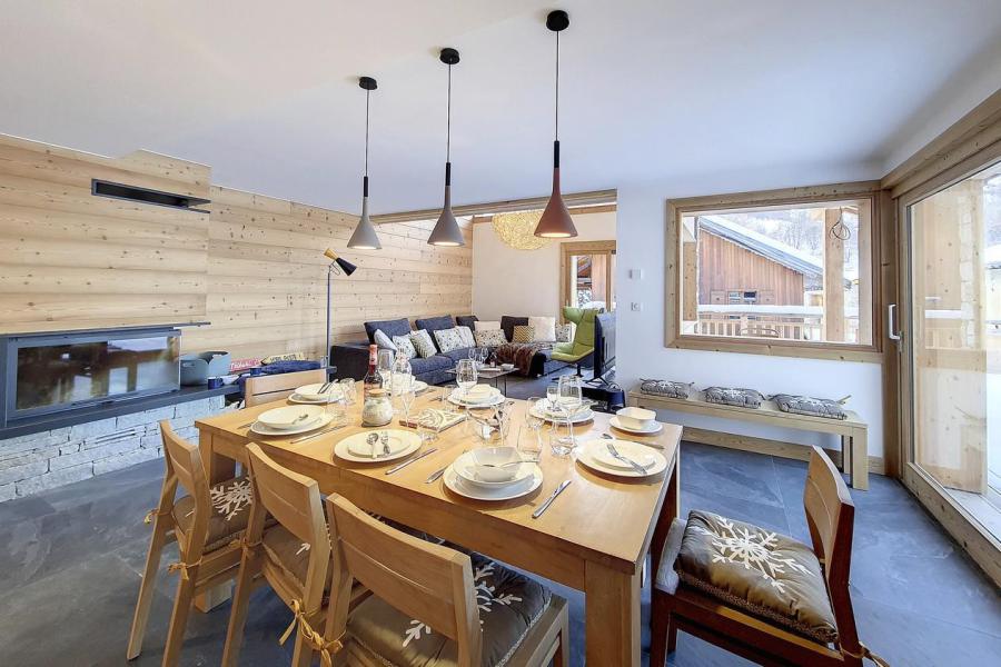 Rent in ski resort 6 room triplex chalet 12 people (ROCHER) - Chalet Eterlou - Les Menuires - Living room