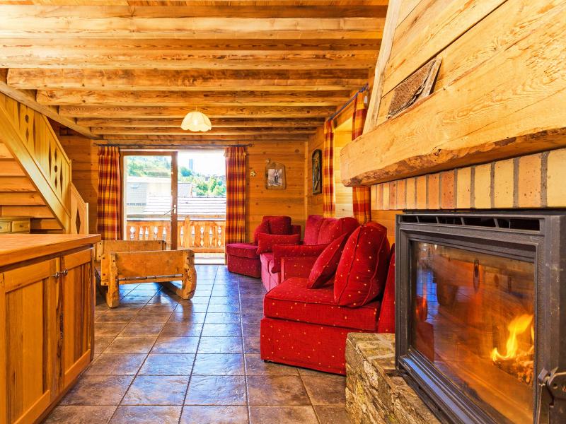 Rent in ski resort Chalet Levassaix - Les Menuires - Fireplace