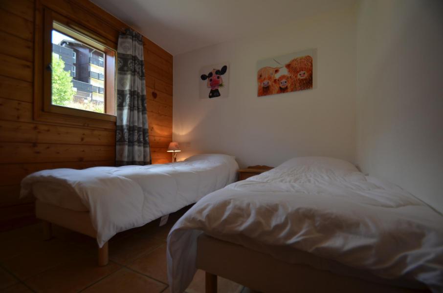 Ski verhuur Appartement 4 kamers 6 personen (A7) - Hameau des Marmottes - Les Menuires - Kamer