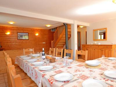 Rent in ski resort Chalet Balcon Cime de Caron - Les Menuires - Dining area