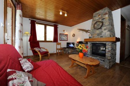 Location au ski Appartement 3 pièces 4-6 personnes - Chalet le Chamois - Les Menuires - Cheminée