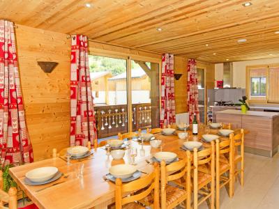 Rent in ski resort Chalet Ski Royal - Les Menuires - Dining area
