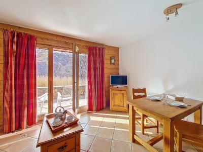Rent in ski resort Studio 2 people (V4) - Hameau des Airelles - Les Menuires - Living room