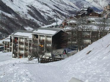 Ski verhuur La Résidence Asters - Les Menuires - Buiten winter