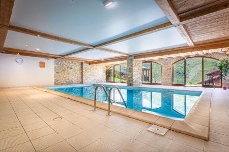 Location au ski Les Chalets de l'Adonis - Les Menuires - Piscine