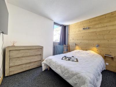 Vakantie in de bergen Appartement 3 kamers 6 personen (201) - Résidence Dorons - Les Menuires - Buiten winter