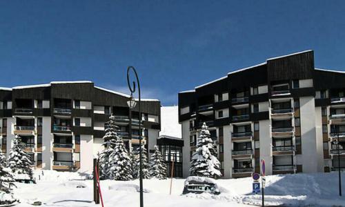 Rent in ski resort Résidence les Mélèzes - Maeva Home - Les Menuires - Winter outside