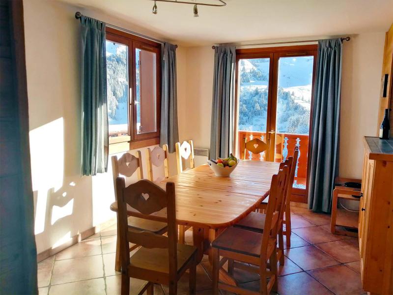 Rent in ski resort Chalet  l'Arclusaz - Méribel-Mottaret - Dining area