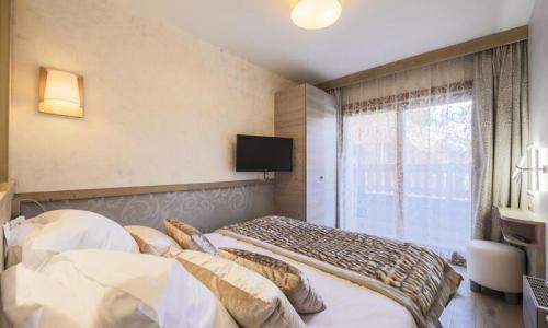 Аренда на лыжном курорте Апартаменты 3 комнат 6 чел. (Prestige 70m²-1) - Résidence Premium l'Hévana - Maeva Home - Méribel - зимой под открытым небом