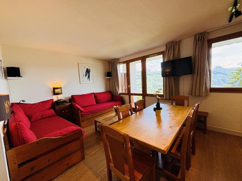 Ski verhuur Appartement 3 kamers 6 personen (006) - Résidence le Domino - Montchavin La Plagne - Woonkamer