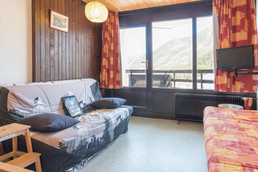 Rent in ski resort 2 room apartment sleeping corner 6 people (MANGIN) - La Résidence la Loubatière - Montgenèvre - Living room