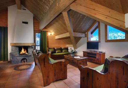 Skiverleih Résidence Chalet des Neiges - Oz 3300 - Kamin