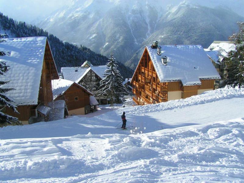 Ski verhuur Résidence Chalet des Neiges - Oz en Oisans - Buiten winter