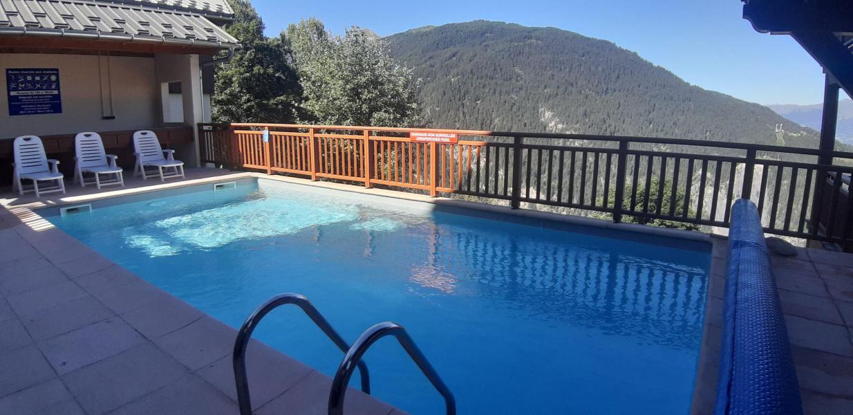 Rent in ski resort Les Chalets des Deux Domaines - Peisey-Vallandry - Swimming pool