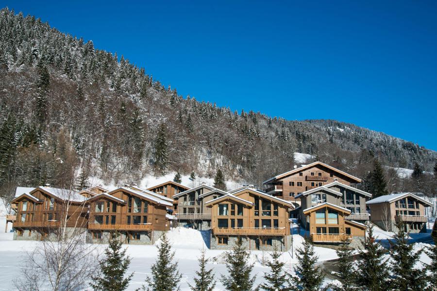 Ski verhuur Résidence Les Portes de Megève - Praz sur Arly - Buiten winter