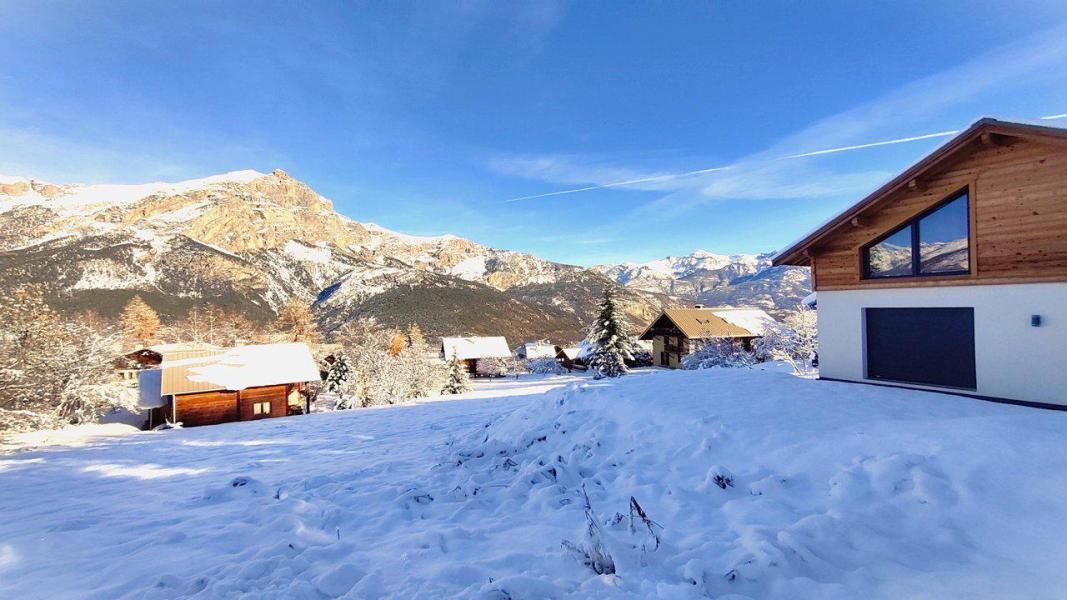Vacances en montagne Chalet triplex 5 pièces 10 personnes - Chalet Le Riou - Puy-Saint-Vincent - Extérieur hiver