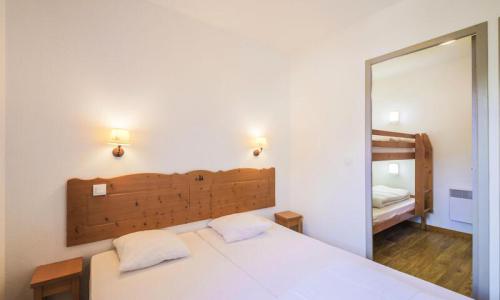 Vacances en montagne Appartement 2 pièces 6 personnes (Confort 32m²-10) - Résidence le Hameau des Ecrins - Maeva Home - Puy-Saint-Vincent - Extérieur hiver