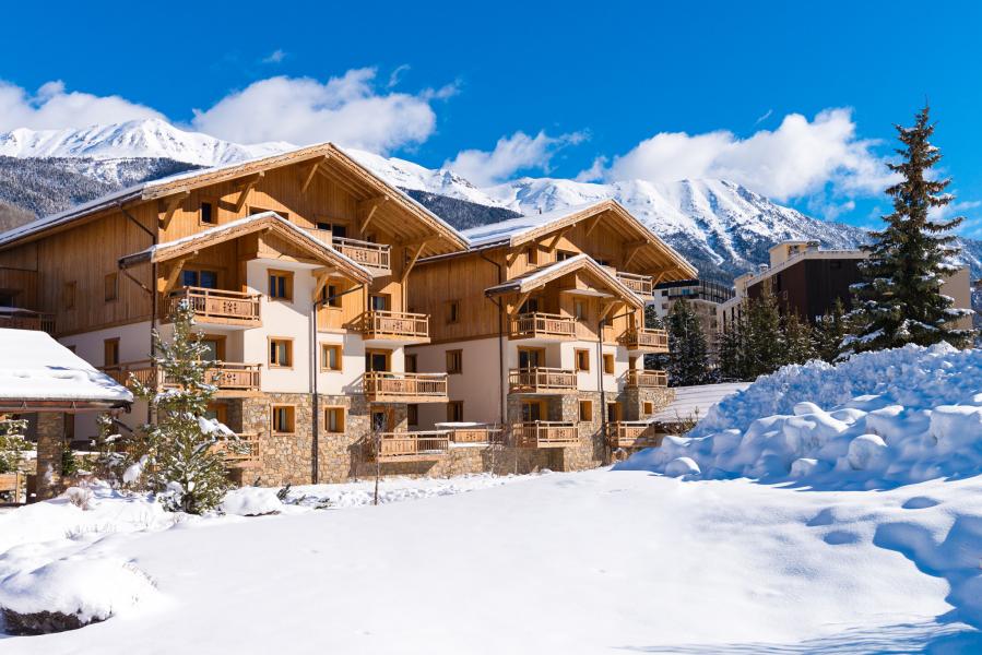 Аренда на лыжном курорте Résidence Le Hameau du Rocher Blanc - Serre Chevalier - зимой под открытым небом