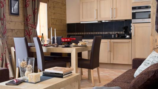 Ski verhuur Résidence CGH Les Chalets de Flambeau - Val Cenis - Woonkamer