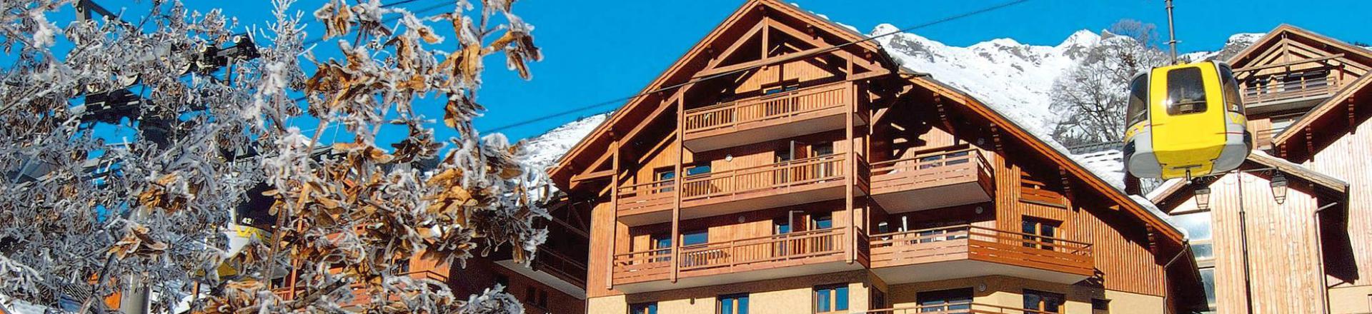 Rent in ski resort Résidence Prestige la Cascade - les Epinettes - Vaujany - Winter outside